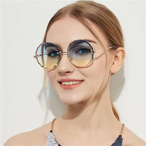 round frame designer sunglasses|More.